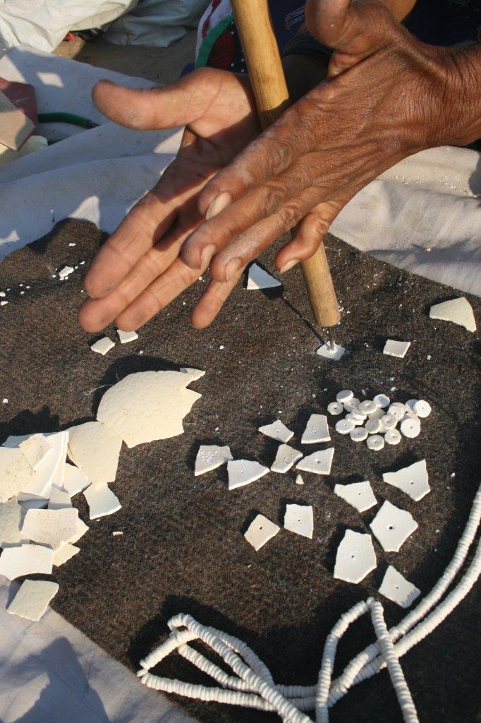 making beads from ostrich shell