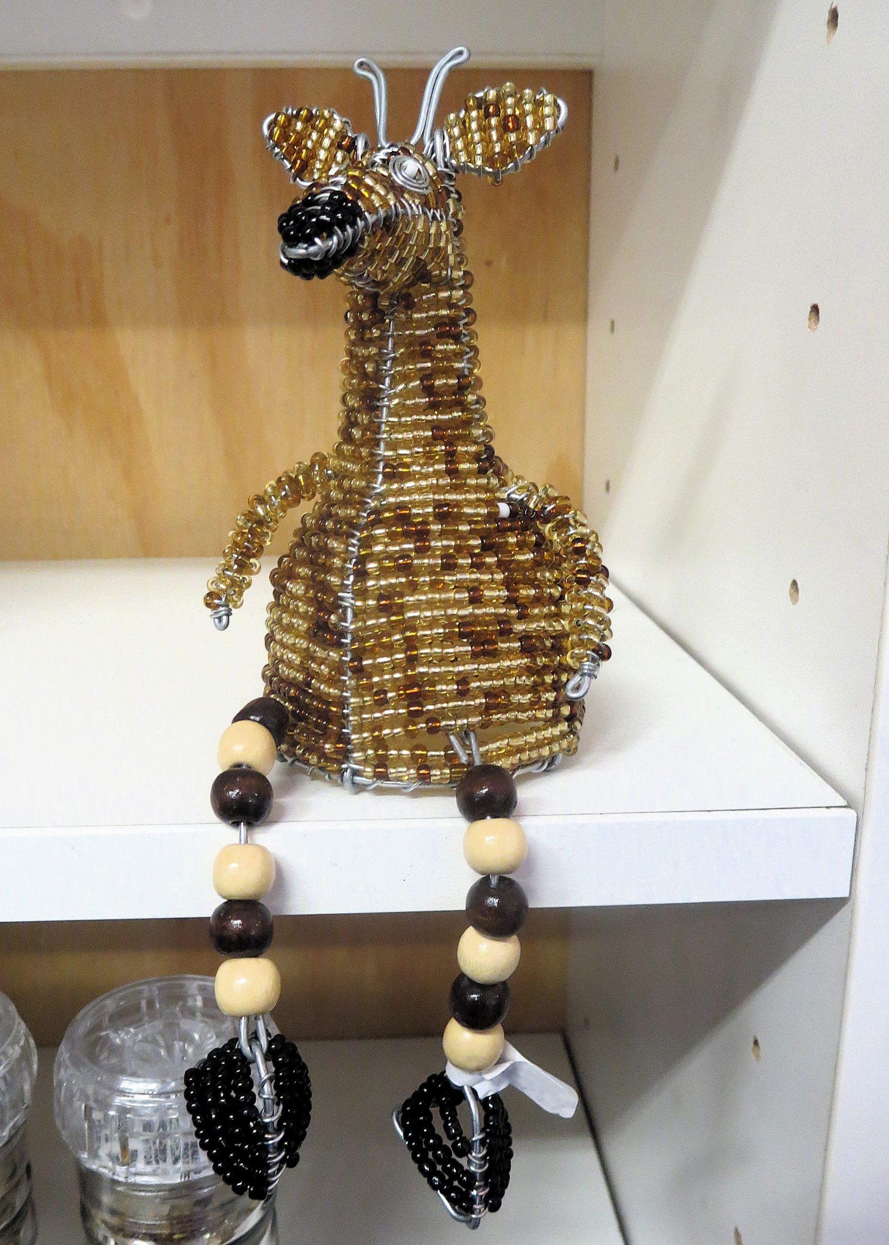 Shelf-Sitting Giraffe